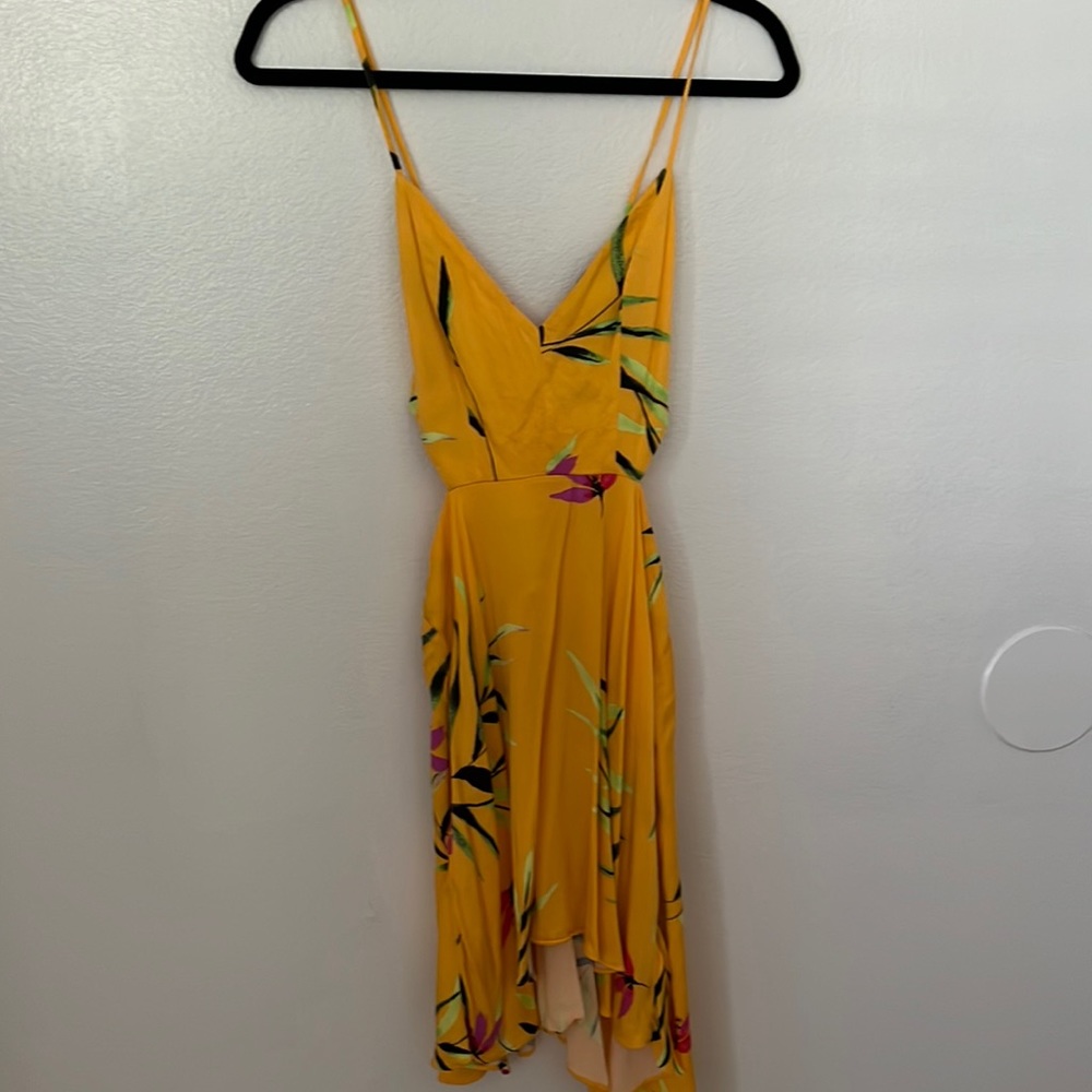 Strappy yellow dress with cut outs